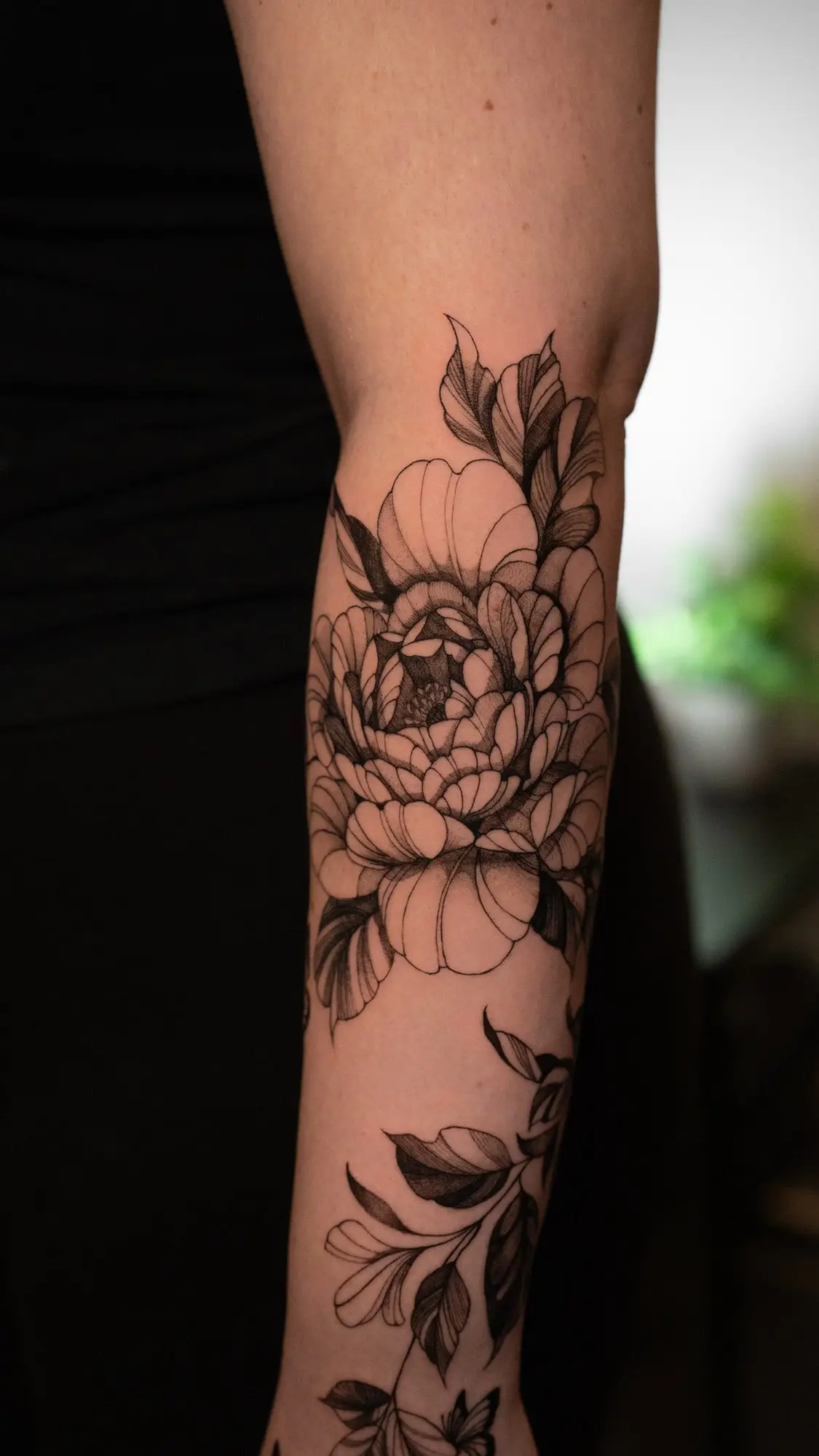Fineline Tattoo aus dem Dado Artist Collective Arbon